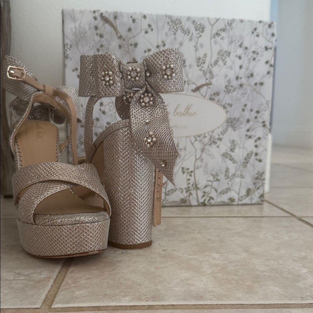 Nicola Bathie Silver Bow Platform Heels